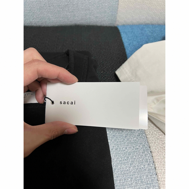 sacai(サカイ)のsacai 青山限定　黒一番 メンズのトップス(Tシャツ/カットソー(半袖/袖なし))の商品写真