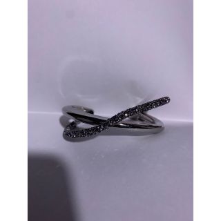 スワロフスキー(SWAROVSKI)のSWAROVSKI  クリスタルダスト クロスカフ(ブレスレット/バングル)