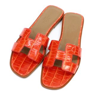 エルメス(Hermes)のエルメス オラン アリゲーター フラット サンダル レディース オレンジ系 HERMES [美品] 【中古】 【アパレル・小物】(サンダル)