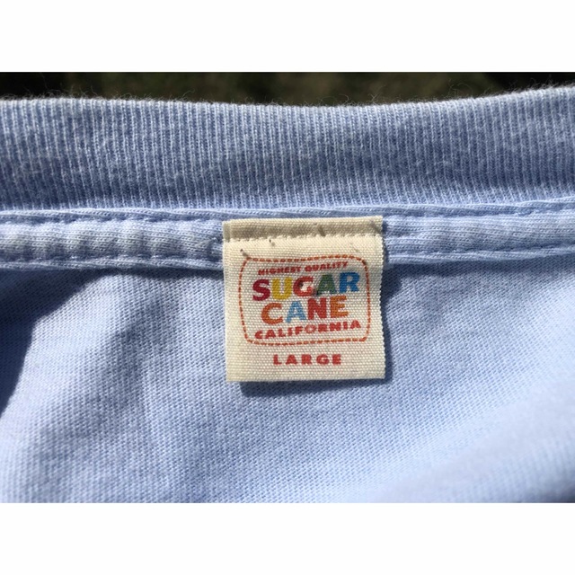Sugar Cane(シュガーケーン)のUSA製　sugar cane 1999 オレンジ　プリント　tシャツ 水色 メンズのトップス(Tシャツ/カットソー(半袖/袖なし))の商品写真