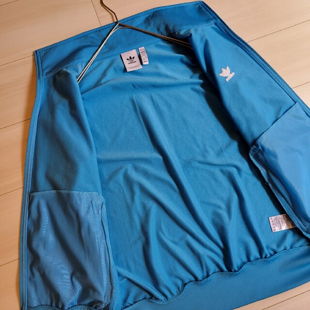 Originals（adidas）(オリジナルス)の希少 XL アディダスオリジナルス 水色 セットアップ トラックジャケット メンズのトップス(ジャージ)の商品写真