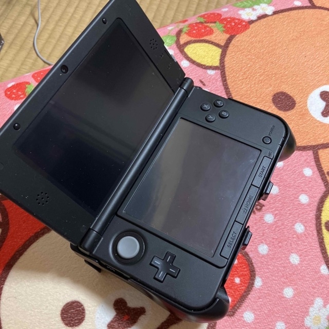 ニンテンドー3DS(ニンテンドー3DS)のニンテンドー3ds LL 本体 ケース コントローラー 充電器付き エンタメ/ホビーのゲームソフト/ゲーム機本体(携帯用ゲーム機本体)の商品写真