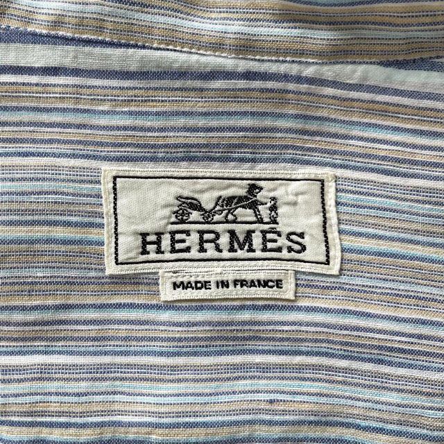 Hermes(エルメス)の美品 エルメス 麻 リネン ストライプ シャツ ブラウス 青 ブルー 長袖 レディースのトップス(シャツ/ブラウス(長袖/七分))の商品写真