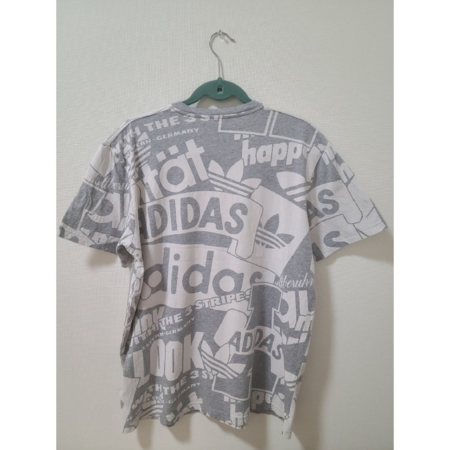 adidas(アディダス)のadidas アディダス makes happinessプリントTシャツ 半袖 メンズのトップス(Tシャツ/カットソー(半袖/袖なし))の商品写真