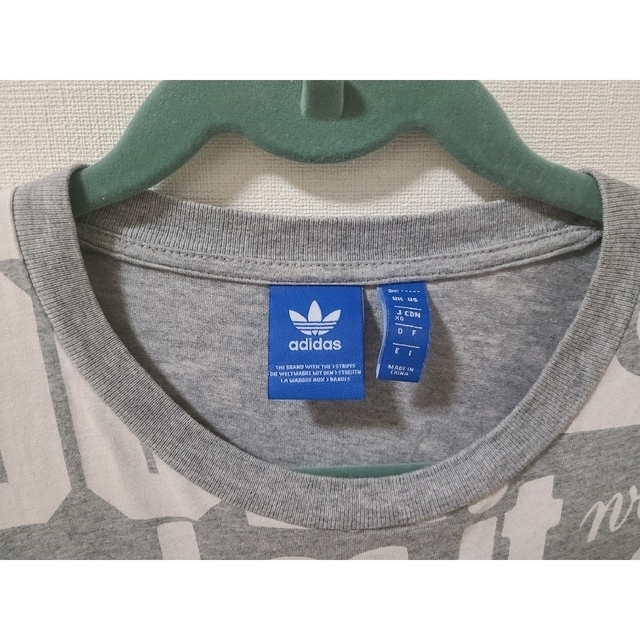 adidas(アディダス)のadidas アディダス makes happinessプリントTシャツ 半袖 メンズのトップス(Tシャツ/カットソー(半袖/袖なし))の商品写真