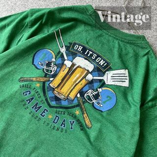 アートヴィンテージ(ART VINTAGE)の【vintage】IZOD ビール BIG funny プリント Tシャツ 緑(Tシャツ/カットソー(半袖/袖なし))