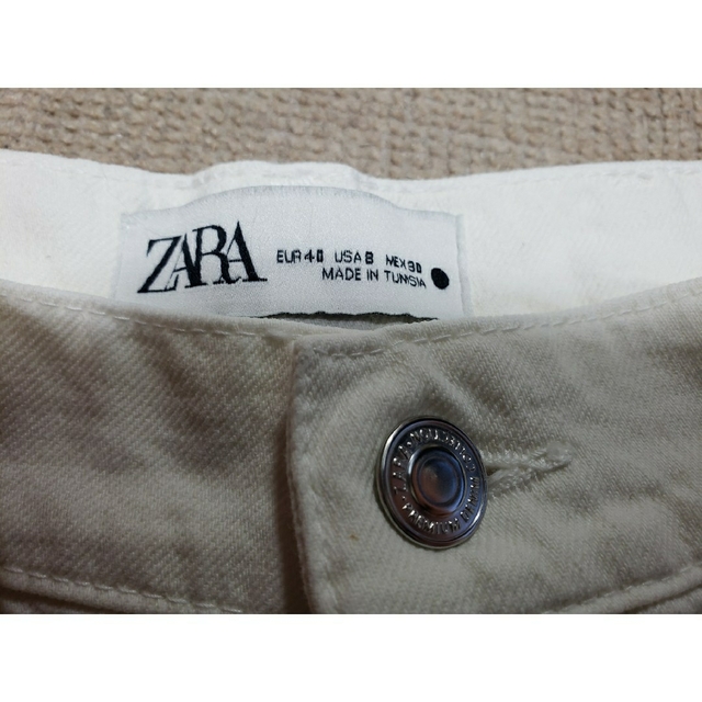 ZARA(ザラ)のZARA 未使用 ワイドレッグパンツホワイト白 40 レディースのパンツ(カジュアルパンツ)の商品写真