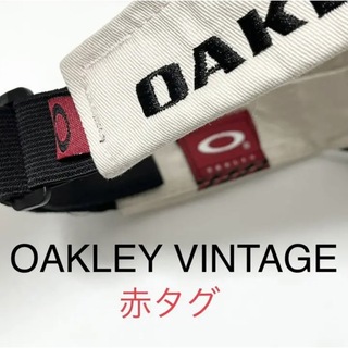 オークリー(Oakley)の【希少】OLD OAKLEYオークリーヴィンテージ赤タグBIGロゴ サンバイザー(サンバイザー)