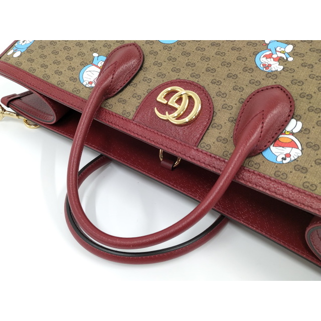 Gucci(グッチ)のGUCCI 2WAYハンドバッグ ドラえもんコラボ ミニGGスプリーム PVC レディースのバッグ(トートバッグ)の商品写真