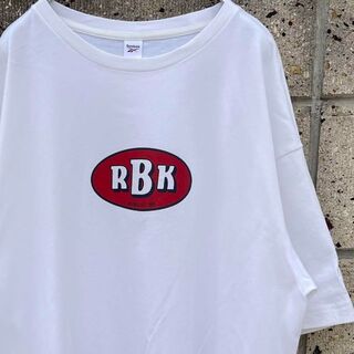 リーボック(Reebok)のREEBOK "RBK" ロゴマーク XLサイズ 古着 コラボTシャツ(Tシャツ/カットソー(半袖/袖なし))