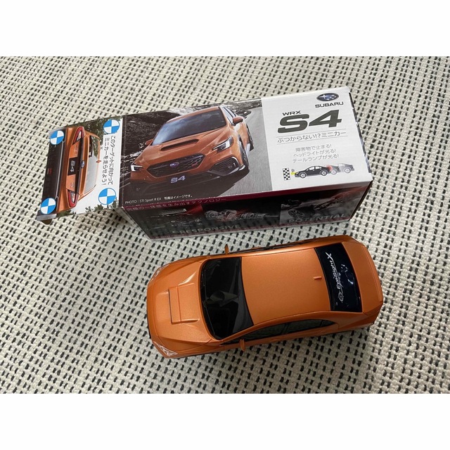 スバル WRX S4のぶつからないミニカー　オレンジ エンタメ/ホビーのおもちゃ/ぬいぐるみ(ミニカー)の商品写真