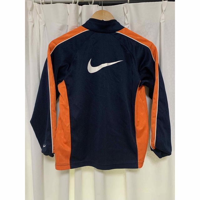 キッズ 上着 ジャージ NIKE 140 オレンジ