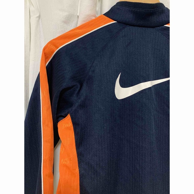 キッズ 上着 ジャージ NIKE 140 オレンジ