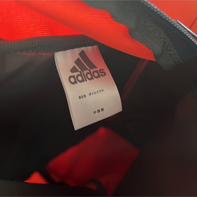 adidas(アディダス)のadidas リュック　オレンジ レディースのバッグ(リュック/バックパック)の商品写真