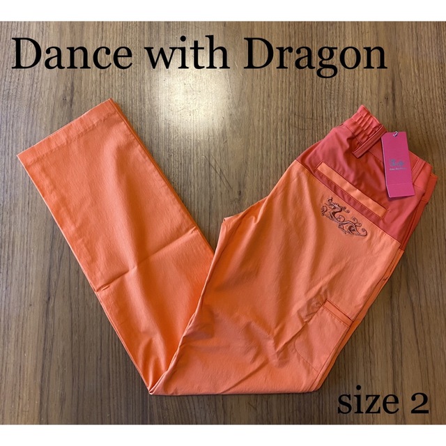 ダンスウィズドラゴン ゴルフウェア レディース パンツ オレンジ サイズ2-