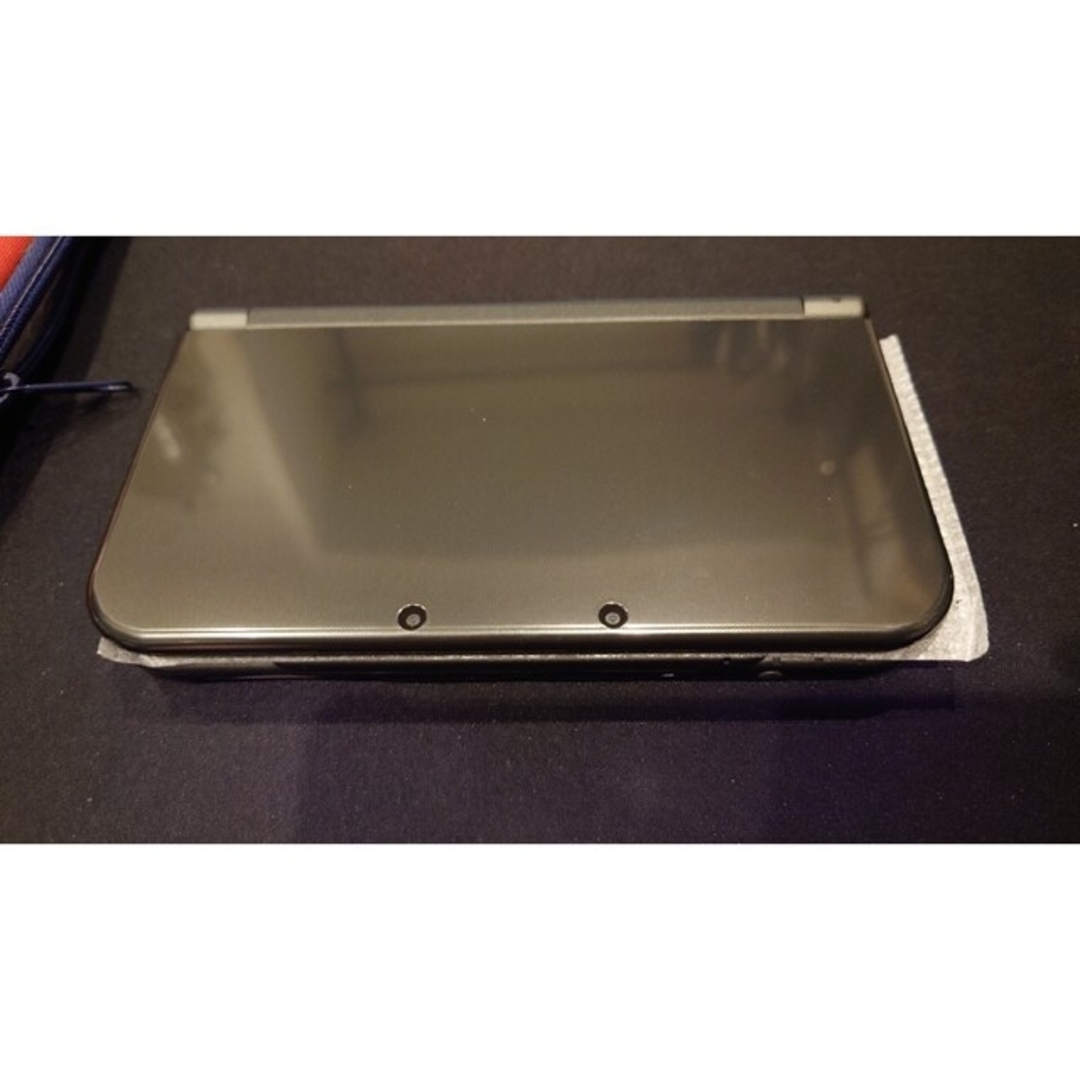 ニンテンドー3DS(ニンテンドー3DS)の【美品】ニンテンドー3DS LL ブラック［モンスターハンターＸ付］ エンタメ/ホビーのゲームソフト/ゲーム機本体(携帯用ゲームソフト)の商品写真