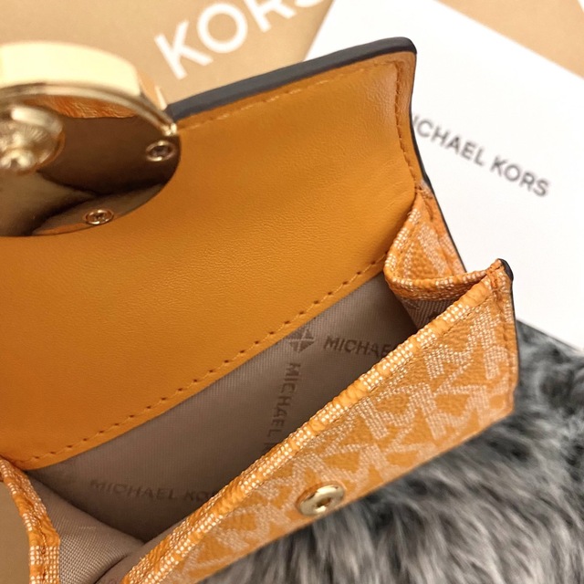 新品☆MICHAEL KORS オレンジ シグネチャー レザー 折り財布