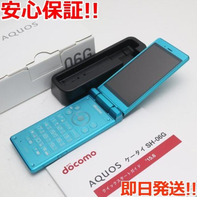 AQUOS(アクオス)の超美品 SH-06G AQUOSケータイ ブルー グリーン  スマホ/家電/カメラのスマートフォン/携帯電話(携帯電話本体)の商品写真