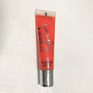 ヴィクトリアズシークレット(Victoria's Secret)の新品】ビクトリアシークレット / FLAVORED グロス オレンジ(リップグロス)