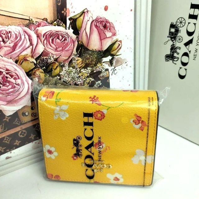 中古】 COACH ミニ財布 花柄 イエロー rahathomedesign.com