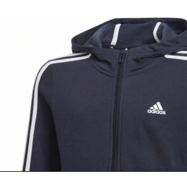 adidas(アディダス)の新品未使用 adidas エッセンシャルズ 3ストライプス パーカー 150cm キッズ/ベビー/マタニティのキッズ服女の子用(90cm~)(ジャケット/上着)の商品写真