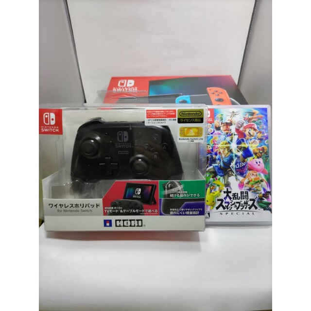 新品Nintendo Switch本体　スマブラ　新品ワイヤレスホリパッド付