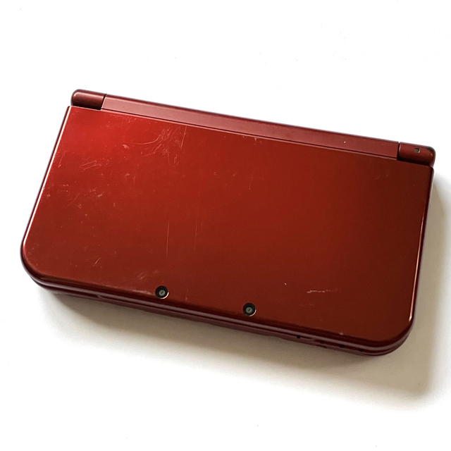 ニンテンドー3DS(ニンテンドー3DS)の【ソフト6点付】NEWニンテンドー3DS LL メタリックレッド 本体 エンタメ/ホビーのゲームソフト/ゲーム機本体(携帯用ゲーム機本体)の商品写真