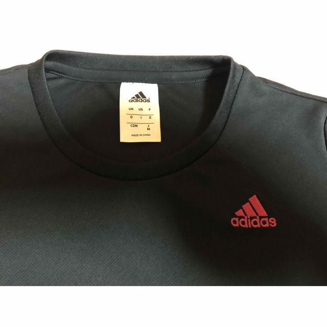 adidas(アディダス)のadidas スポーツTシャツ　黒×ピンク　M スポーツ/アウトドアのランニング(ウェア)の商品写真