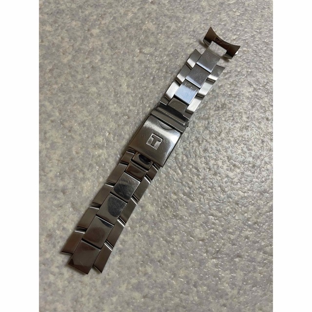 TISSOT(ティソ)のTISSOT V8　クオーツ クロノグラフ用バンド メンズの時計(金属ベルト)の商品写真