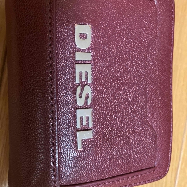 DIESEL(ディーゼル)の【小雪様専用】DIESEL ﾃﾞｨｰｾﾞﾙ 2つ折り財布 着脱可能 レッド レディースのファッション小物(財布)の商品写真