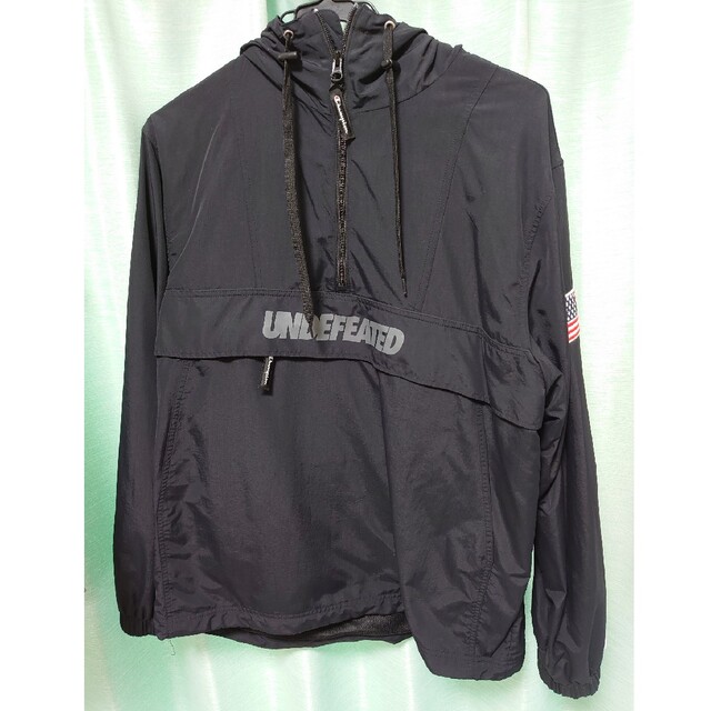 UNDEFEATED(アンディフィーテッド)のundefeated champion アノラックパーカー メンズのジャケット/アウター(ナイロンジャケット)の商品写真