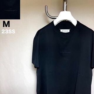 マルタンマルジェラ(Maison Martin Margiela)の新品 M マルジェラ 23ss ロゴ反転Tシャツ 黒黒 4724(Tシャツ/カットソー(半袖/袖なし))
