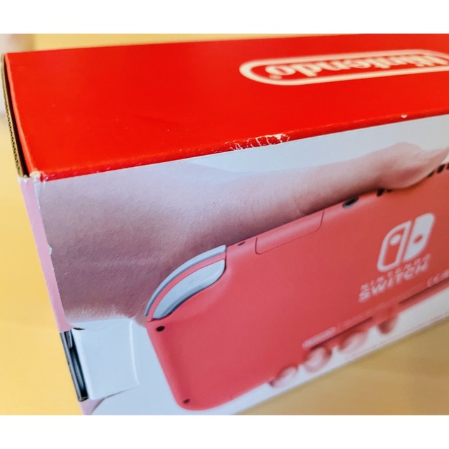 Nintendo Switch(ニンテンドースイッチ)の新品未開封  Switch ライト　本体　コーラルピンク　 エンタメ/ホビーのゲームソフト/ゲーム機本体(携帯用ゲーム機本体)の商品写真
