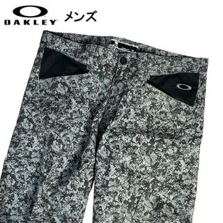 オークリー(Oakley)のOAKLEY オークリー  ストレッチパンツ スカル 総柄 グレー 36(ウエア)