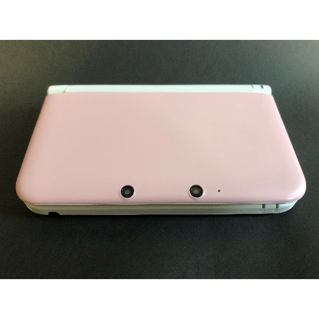 ニンテンドー3DS(ニンテンドー3DS)の【最終値下】任天堂3DSLL　ピンク×ホワイト　中古　タッチペンなし　 エンタメ/ホビーのゲームソフト/ゲーム機本体(家庭用ゲーム機本体)の商品写真