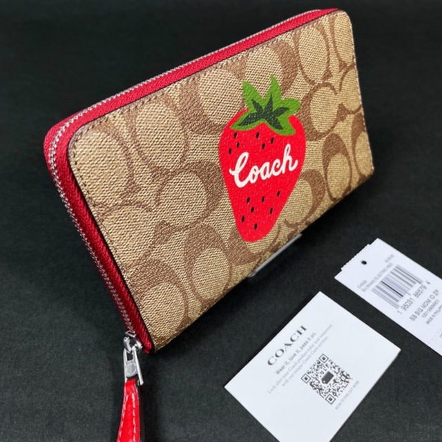 新品未使用☺️COACHコーチストラップ付シグネチャー長財布ライトカーキ白-