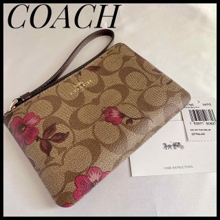 コーチ(COACH)の【未使用】COACH コーチ　フラワーミニポーチ　シグネチャー　花柄　PVC(ポーチ)