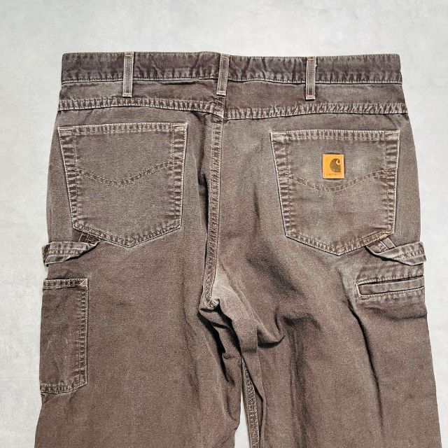 carhartt(カーハート)の【Carhartt】カーハート ダック地ブラウンワークパンツ 古着カーゴパンツ メンズのパンツ(ワークパンツ/カーゴパンツ)の商品写真