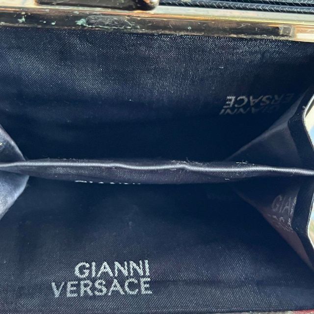 VERSACE(ヴェルサーチ)の【極美品 】VERSACE ヴェルサーチ  がま口　２つ折り財布　太陽神　皮　黒 レディースのファッション小物(財布)の商品写真