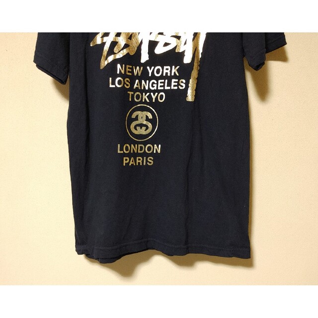 STUSSY(ステューシー)のSTUSSY＊Tシャツ・半袖・サイズＬ＊両面プリントロゴ入り・ブラック・ゴールド レディースのトップス(Tシャツ(半袖/袖なし))の商品写真