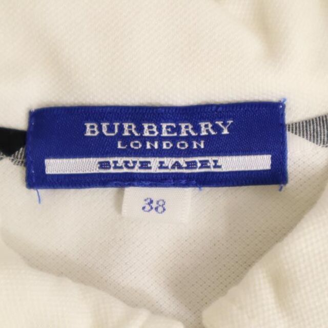 BURBERRY BLUE LABEL(バーバリーブルーレーベル)のバーバリーブルーレーベル 三陽商会 半袖 ポロシャツ 38 ホワイト系 BURBERRY BLUE LABEL 袖リボン 鹿の子 レディース 【中古】  【230518】 レディースのトップス(ポロシャツ)の商品写真