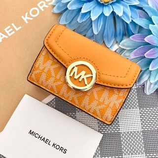 マイケルコース(Michael Kors)の【新品】MICHAEL KORS イエロー シグネチャー レザー 折り財布(財布)