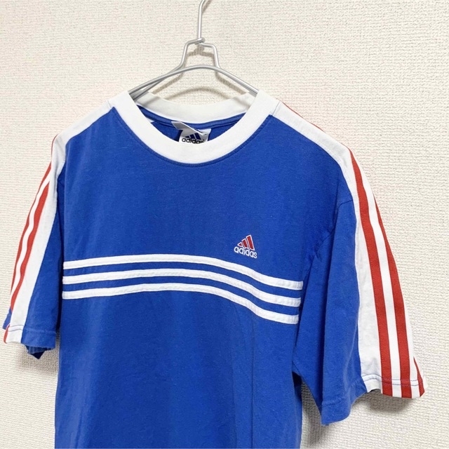 adidas(アディダス)の90s adidas Tシャツ メンズL 日本製 万国旗タグ 青 赤 白  メンズのトップス(Tシャツ/カットソー(半袖/袖なし))の商品写真