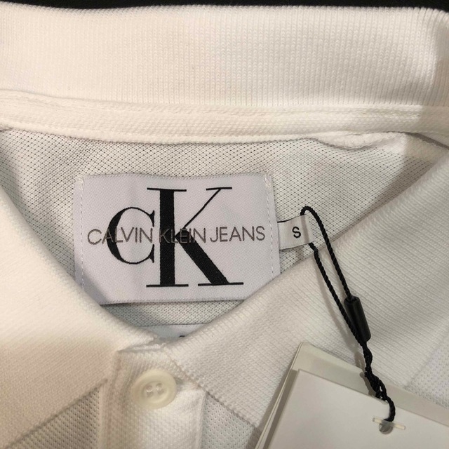 ck Calvin Klein(シーケーカルバンクライン)の新品タグ付き★CALVIN KLEIN JEANS【CK】ホワイト　ポロシャツ メンズのトップス(ポロシャツ)の商品写真