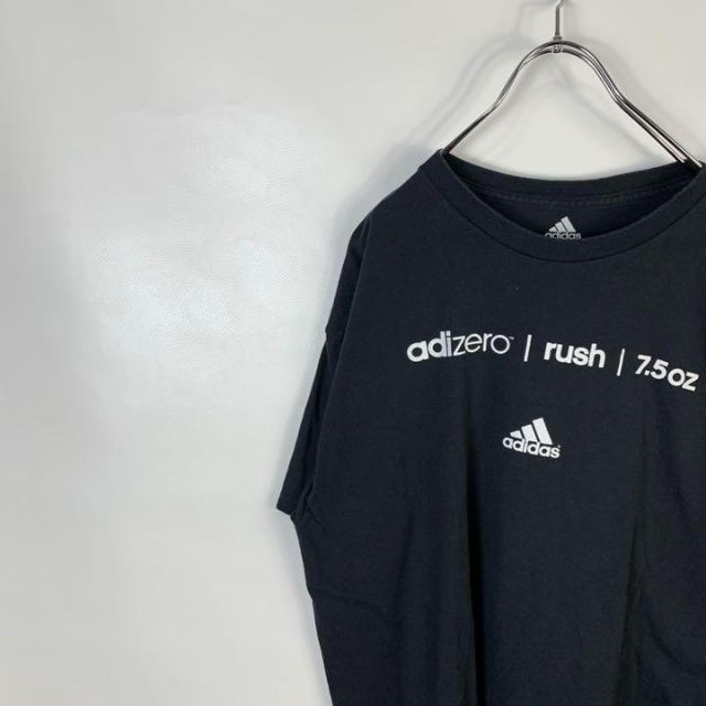 adidas(アディダス)のC563 アディダス　ビッグプリント　バックロゴ　L 黒　ブラック　靴　半袖 メンズのトップス(Tシャツ/カットソー(半袖/袖なし))の商品写真