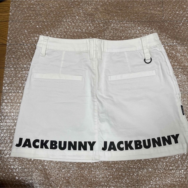 PEARLY GATES(パーリーゲイツ)の本日迄JACKBUNNYゴルフロゴプリントスカートサイズ2 未使用品 スポーツ/アウトドアのゴルフ(ウエア)の商品写真