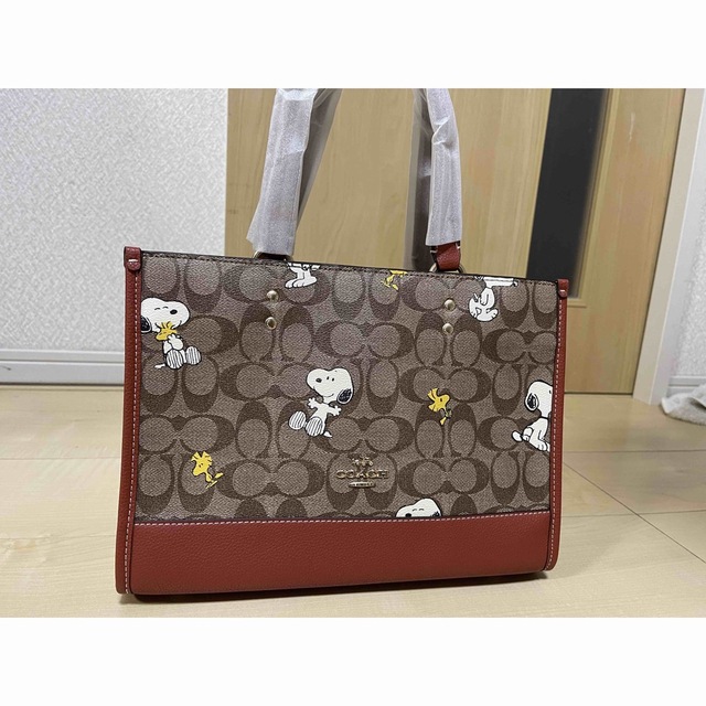 【COACH X PEANUTS】コーチコラボ・スヌーピー ウッドストックカーキレッドウッドマルチ素材