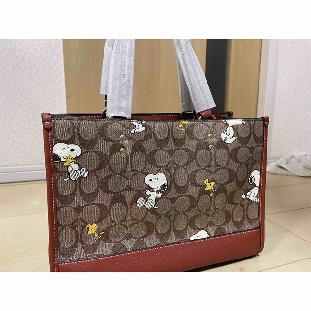 COACH(コーチ)の【COACH X PEANUTS】コーチコラボ・スヌーピー ウッドストック レディースのバッグ(トートバッグ)の商品写真