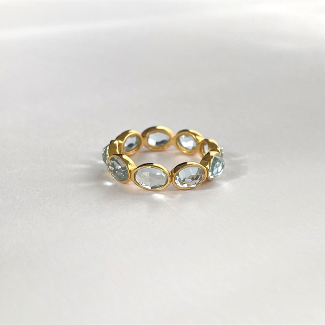 Blue topaz 22k gold plated eternity ring