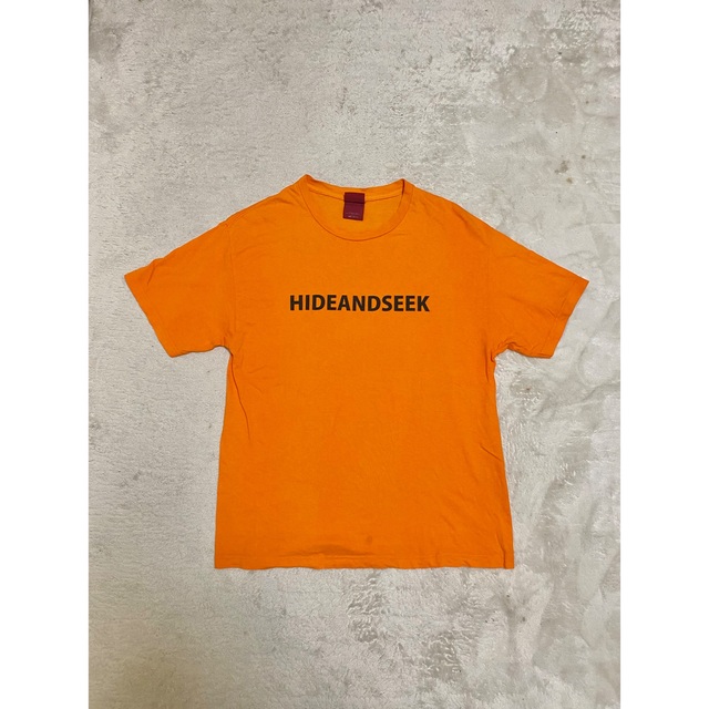 HIDE AND SEEK(ハイドアンドシーク)のHIDE AND SEEK Tag S/S Tee ORANGE メンズのトップス(Tシャツ/カットソー(半袖/袖なし))の商品写真